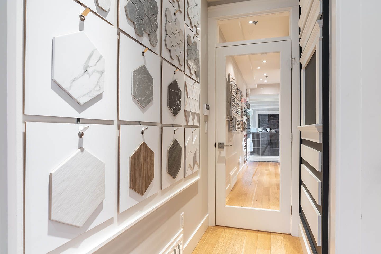 Interior of Ballard Fine Homes showroom showing floor samples