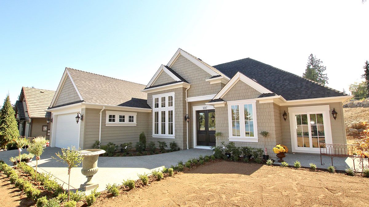 Grey house with white outlined windows