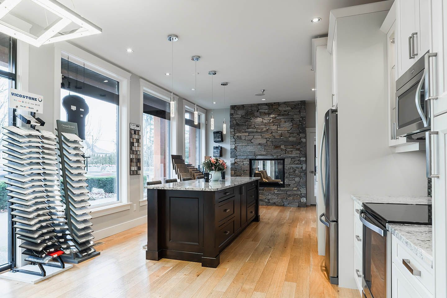 Room with large kitchen island and kitchen appliances