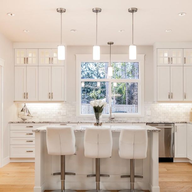 Dining area with white chairs