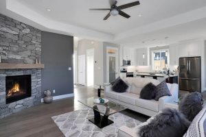 1168 Silversmith Place living space with kitchen in background