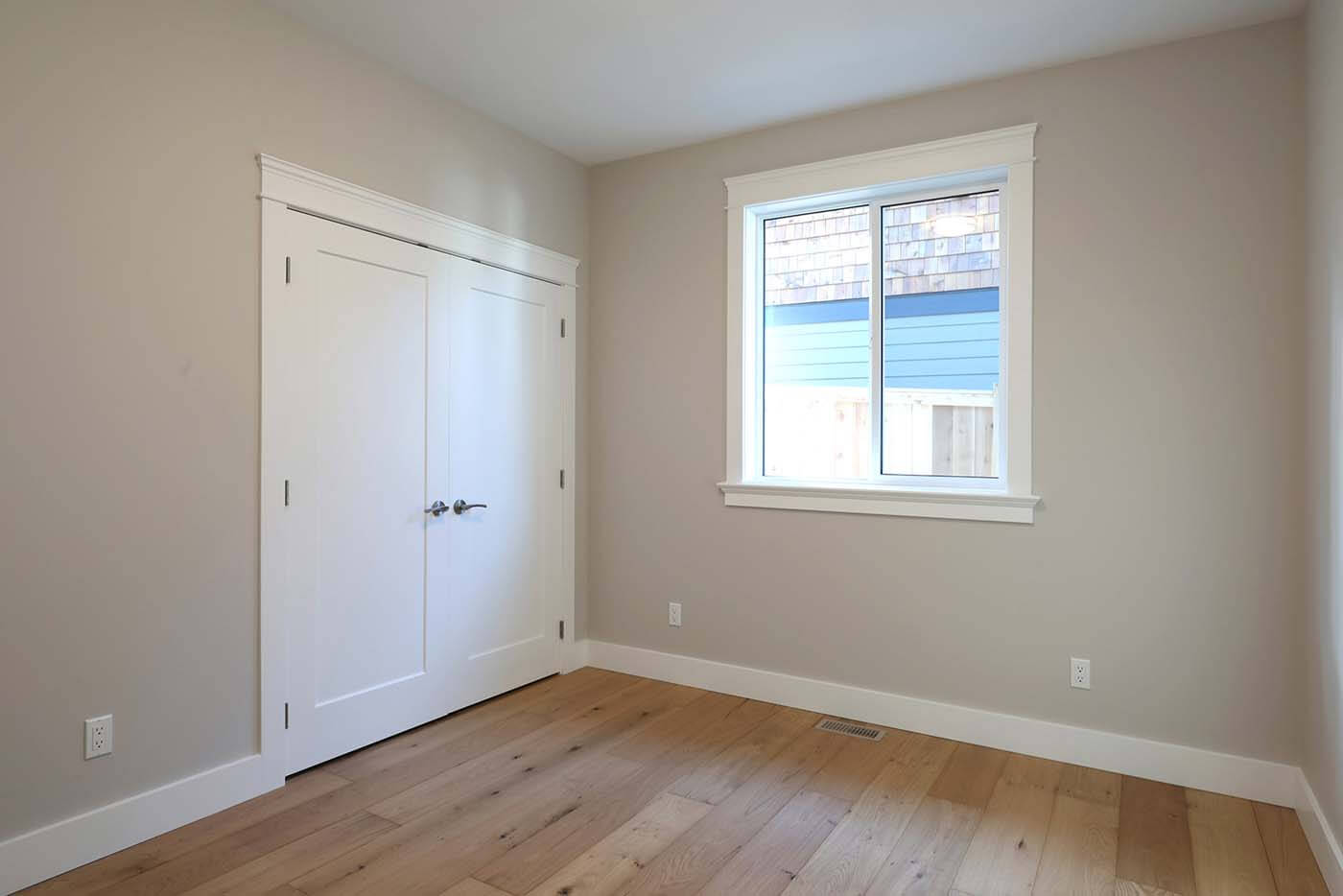 3321 Klanawa Crescent bedroom with closet and window