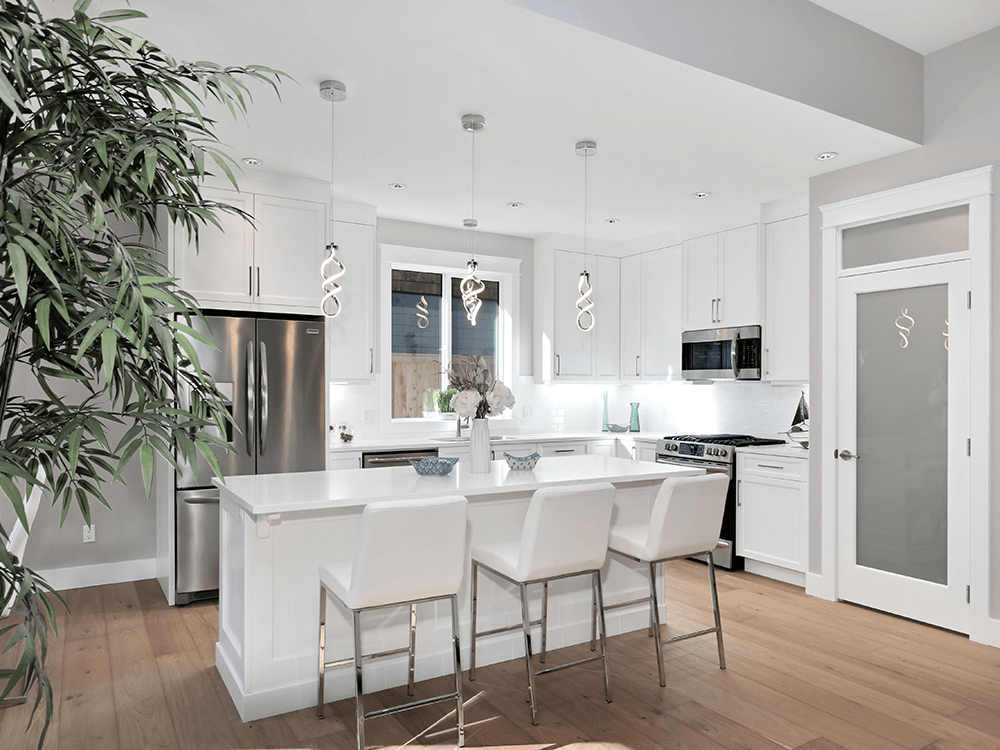 Angled view of another beautifully designed and constructed kitchen by Ballard Fine Homes.