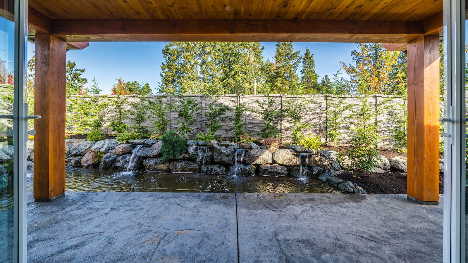 A beautiful water feature in the backyard of a home on Vancouver Island.
