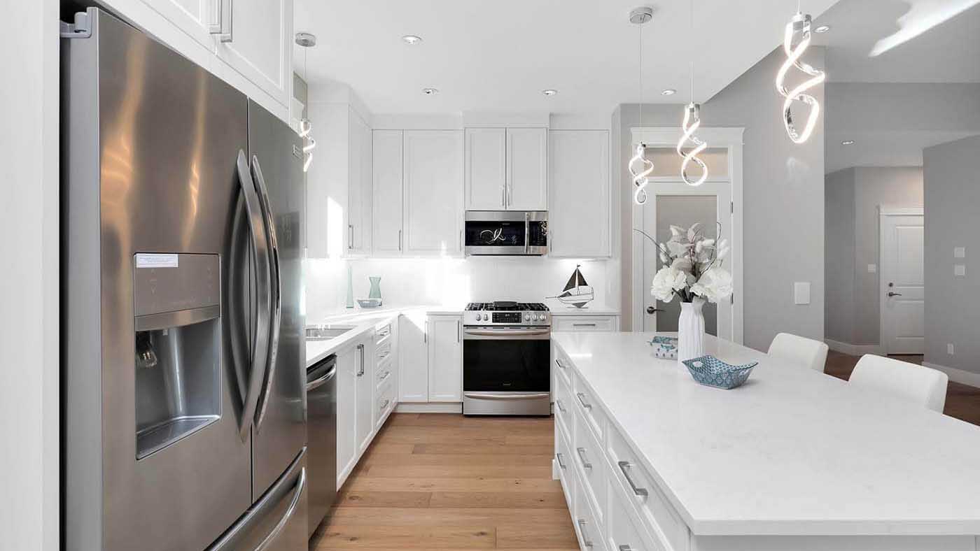 A high-end, custom designed kitchen by Ballard Fine Homes.