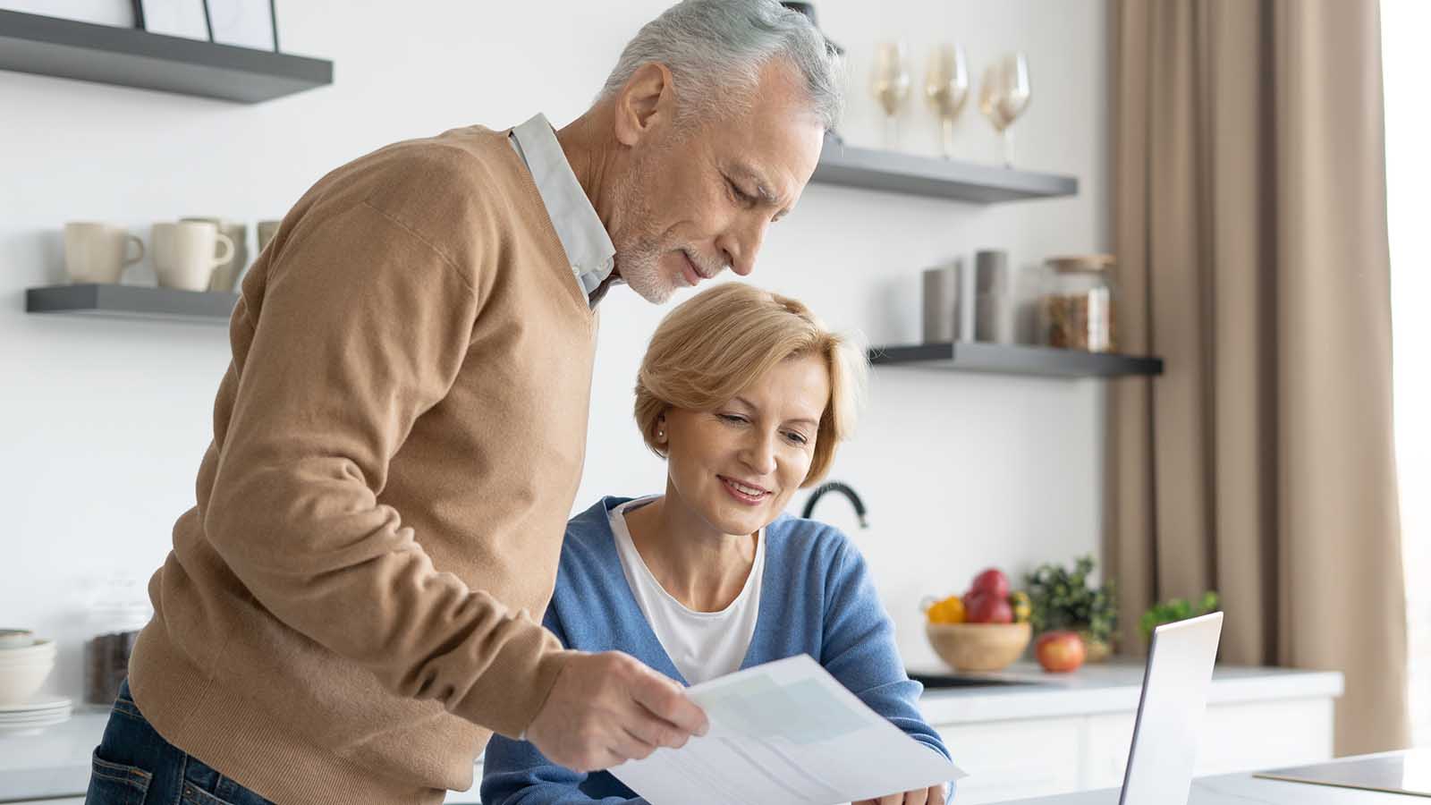 Wife and husband paying utility bill online